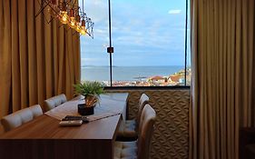 Apto com vista para o mar e o farol - loft 323